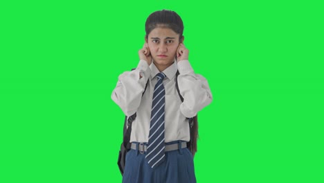 Guilty-Indian-school-girl-saying-sorry-and-apologizing-Green-screen