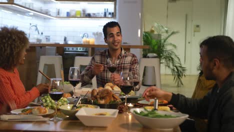 millennial adult friends celebrating thanksgiving together at home