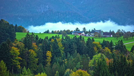 Remote-Alps-village-and-forestry-mountains,-time-lapse-view