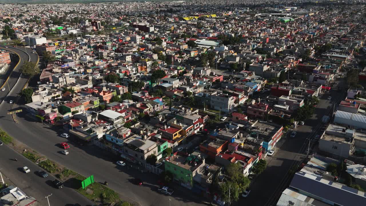 Drone flying over Ecatepec, Mexico, showing a typical Latin American neighborhood