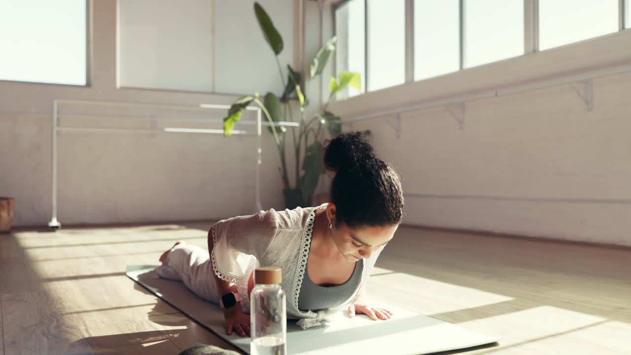 A woman practicing yoga indoors
