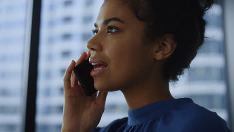 Businesswoman-having-conversation-on-smartphone.-Entrepreneur-talking-phone