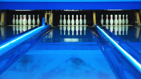 colorful bowling alley. bowling lane waiting for gamers. colorful illumination