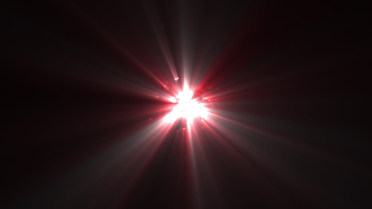 Red Glowing Energy Orb Emitting Moving Light Rays From Central Point from Darkness. Abstract Energy Flares Shining on Black Background. UFO Alien Style Effect