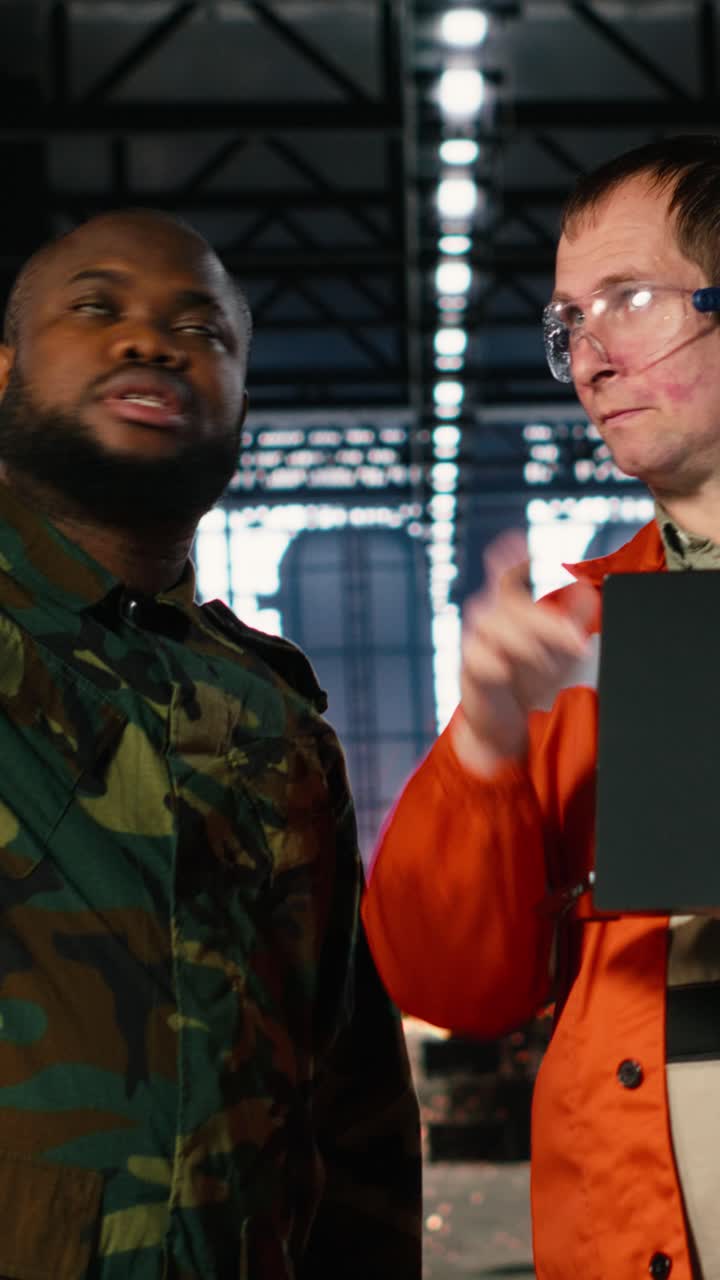 Vertical Video Soldier and engineer manages production adapted for armament manufacturing