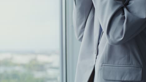 businessman near a window