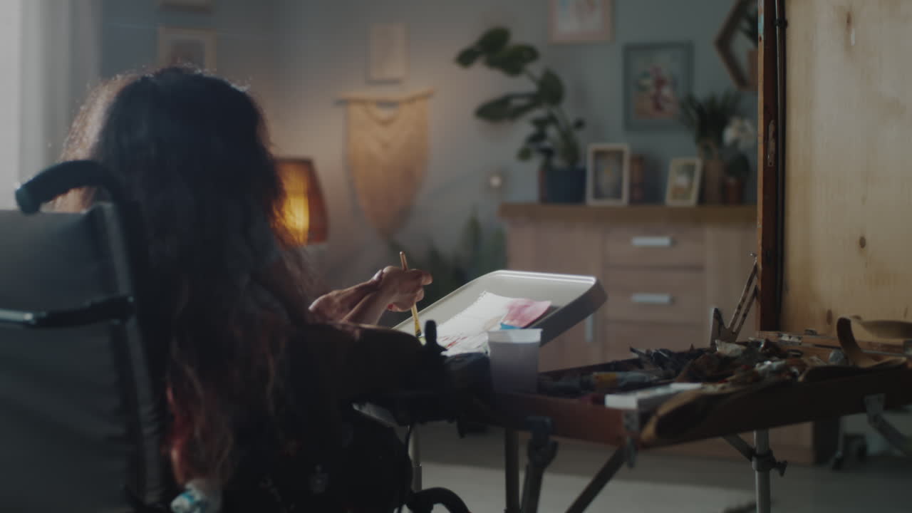 Woman Painting in Wheelchair