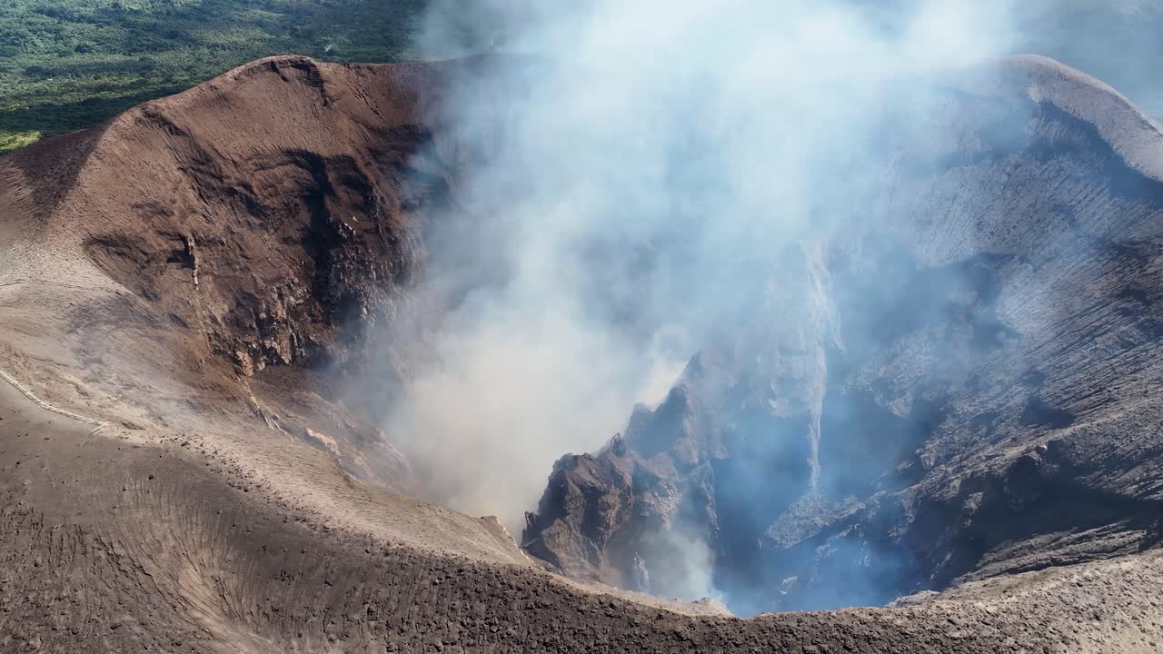 Steam from Mount Yasur active volcano, aerial wide of crater rim. Tanna Island, Vanuatu