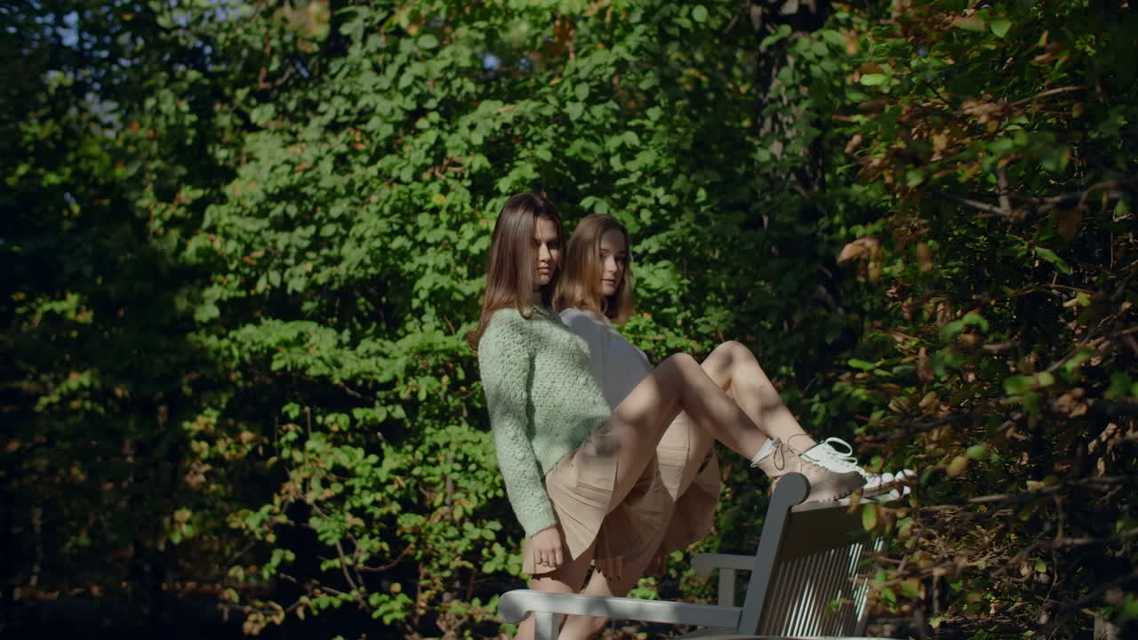 Two Young Women in Autumn Park