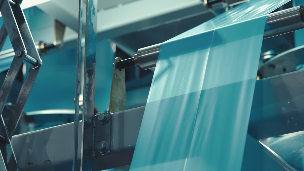Manufacturing process of plastic film on an industrial machine