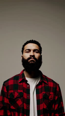 man in red plaid shirt