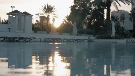 hotel swimming pool by the sunset