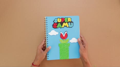 childres notebook with custom made cover, video game theme