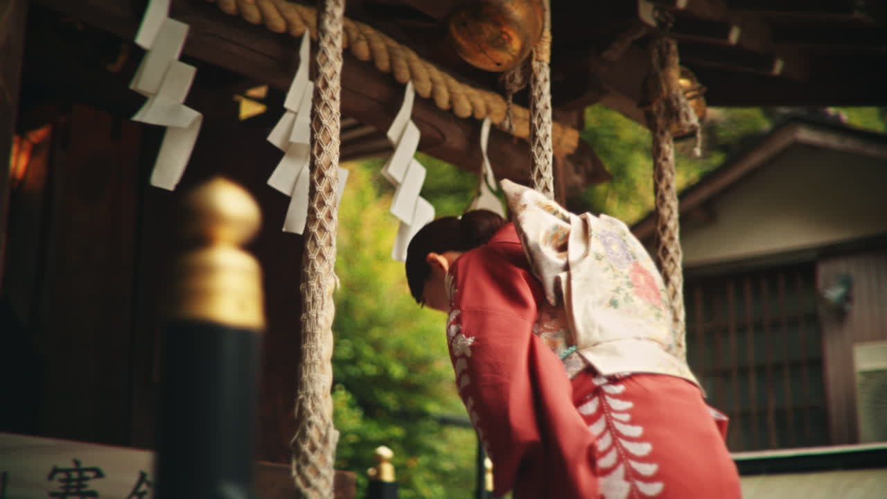 Woman in Kimono at a Shrine