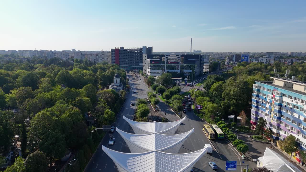 Drone View Over the Heroes' Gate Monument in Eroii Revolutiei Square, Colorful Buildings, Bucharest, Romania
