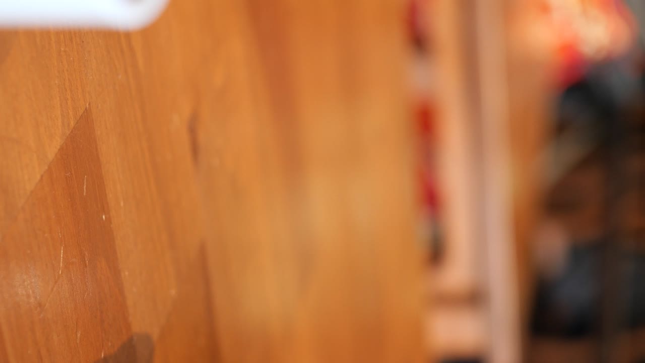 Glass cup of tea on a wooden table