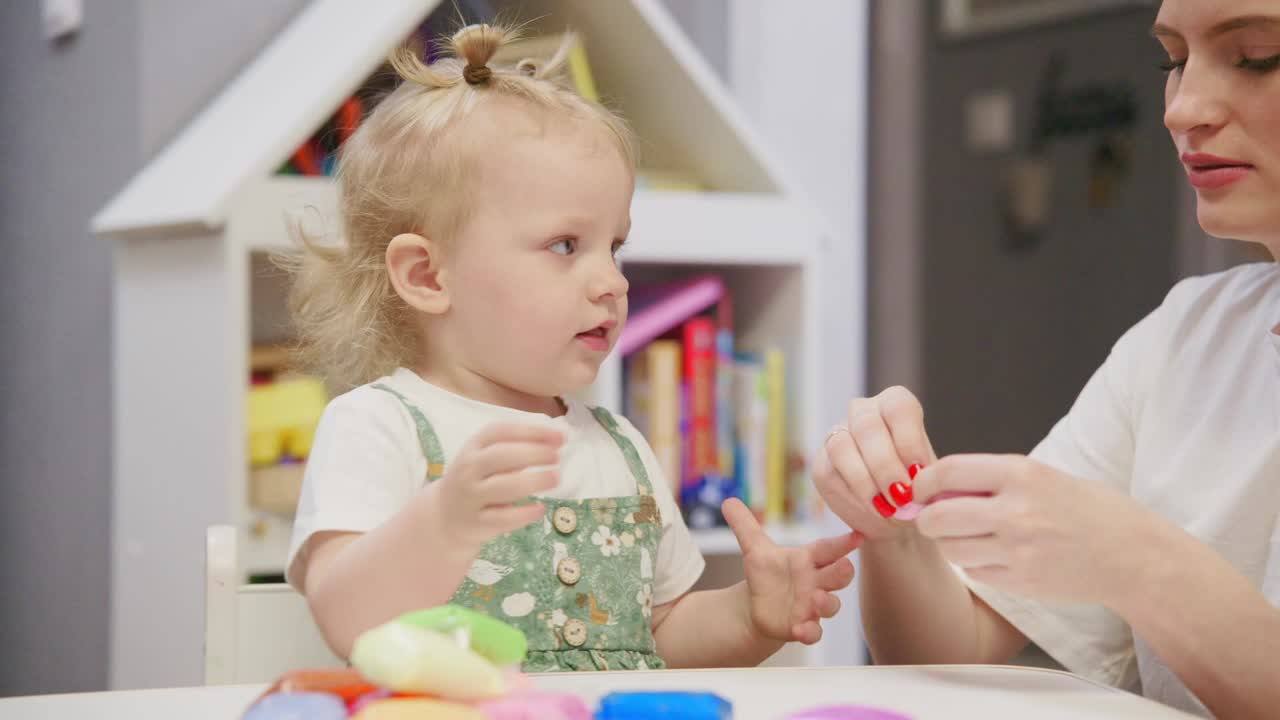 Mother and Toddler Girl Playing with Colorful Modeling Clay