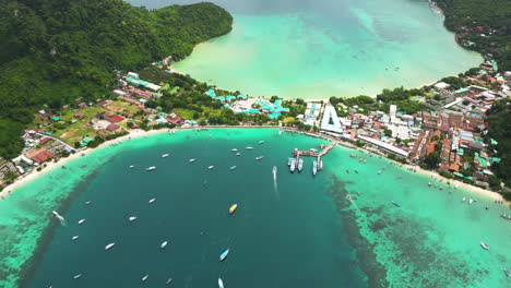 Boat-traffic-at-tropical-Koh-Phi-Phi-Don-island,-Thailand-aerial-time-lapse