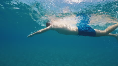 freestyle swimming in the ocean