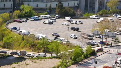 parking lot with vehicles in city