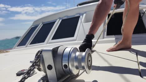 person mooring a boat