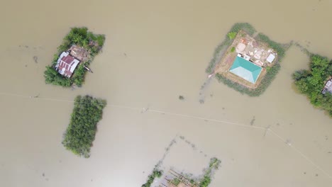 top view of a village with floating homes in bangladesh, south asia. aerial drone shot