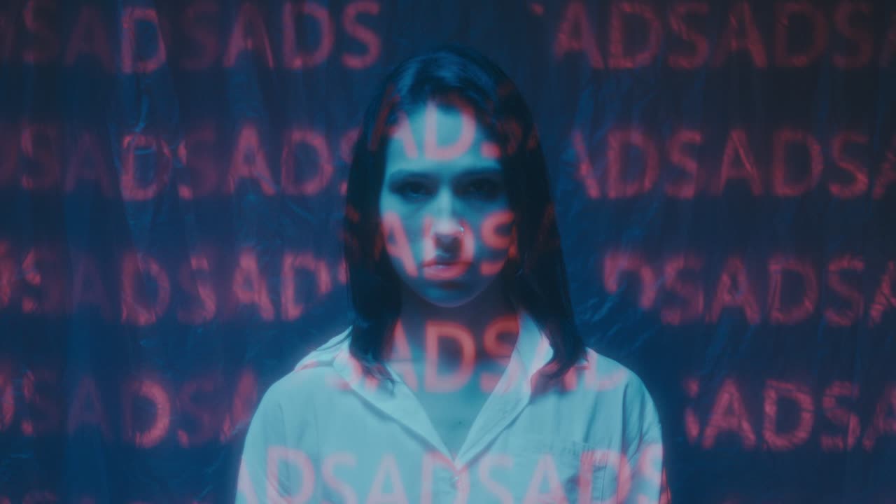 Woman in Neon Light with Text Overlay