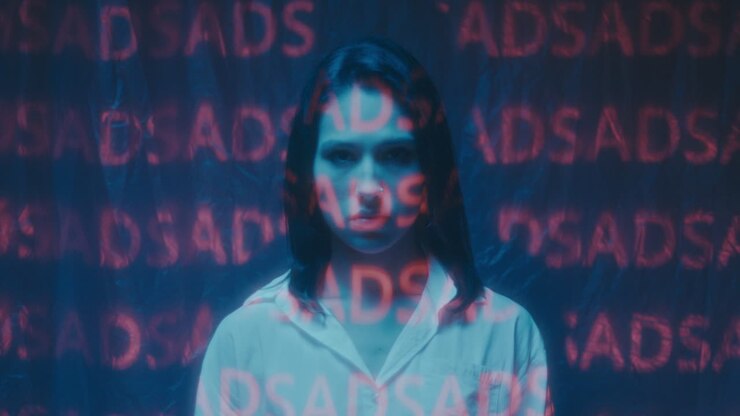 Woman in Neon Light with Text Overlay
