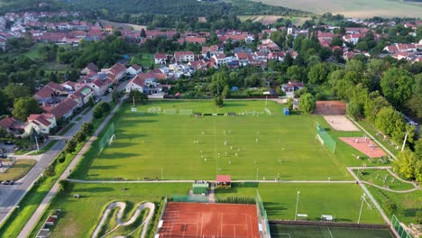 the-camera-approaches-the-direction-of-the-soccer-field-where-the-soccer-match-is-currently-being-played