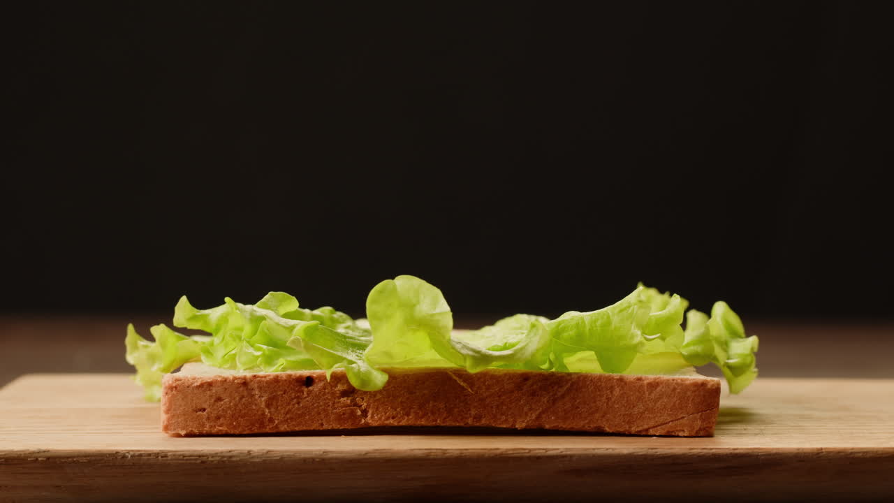 Making a Ham and Lettuce Sandwich