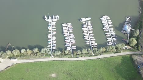 drone shot over the small harbor for boat and yacht in the netherlands