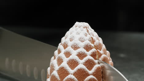 pine cone cake being cut