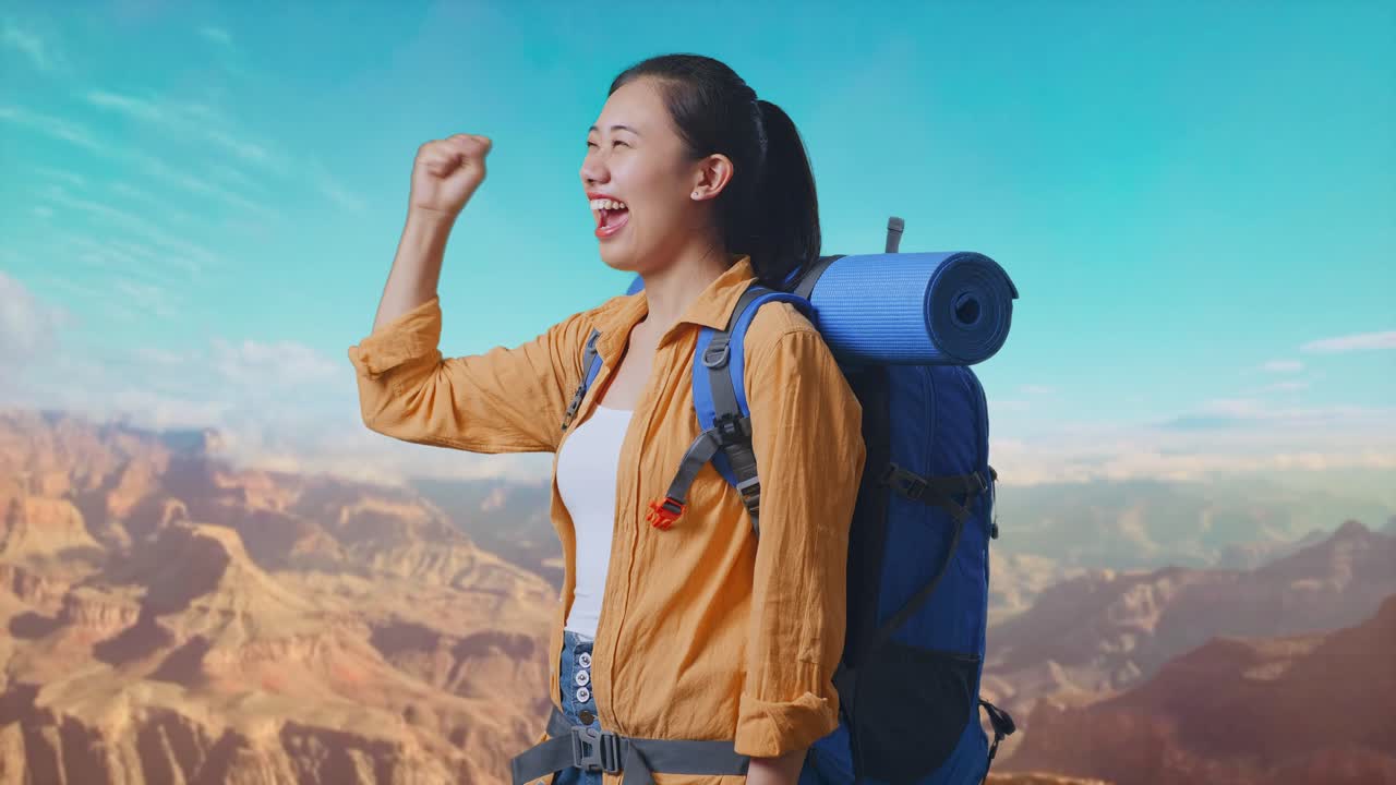 Side View Of Asian Female Hiker With Mountaineering Backpack Screaming Goal Celebrating The Success While Traveling At The Top Of Mountain