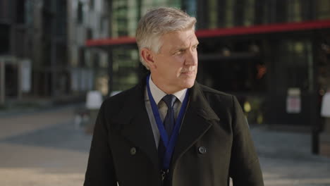 portrait-of-professional-businessman-getting-ready-for-meeting-looking-confident-in-city