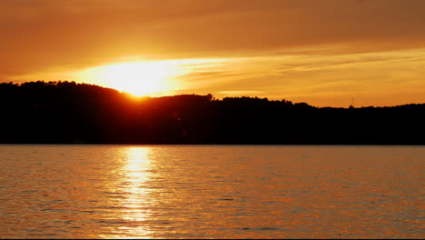 This-is-a-time-lapse-of-the-sun-setting-over-a-lake