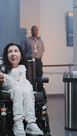 woman in wheelchair at airport