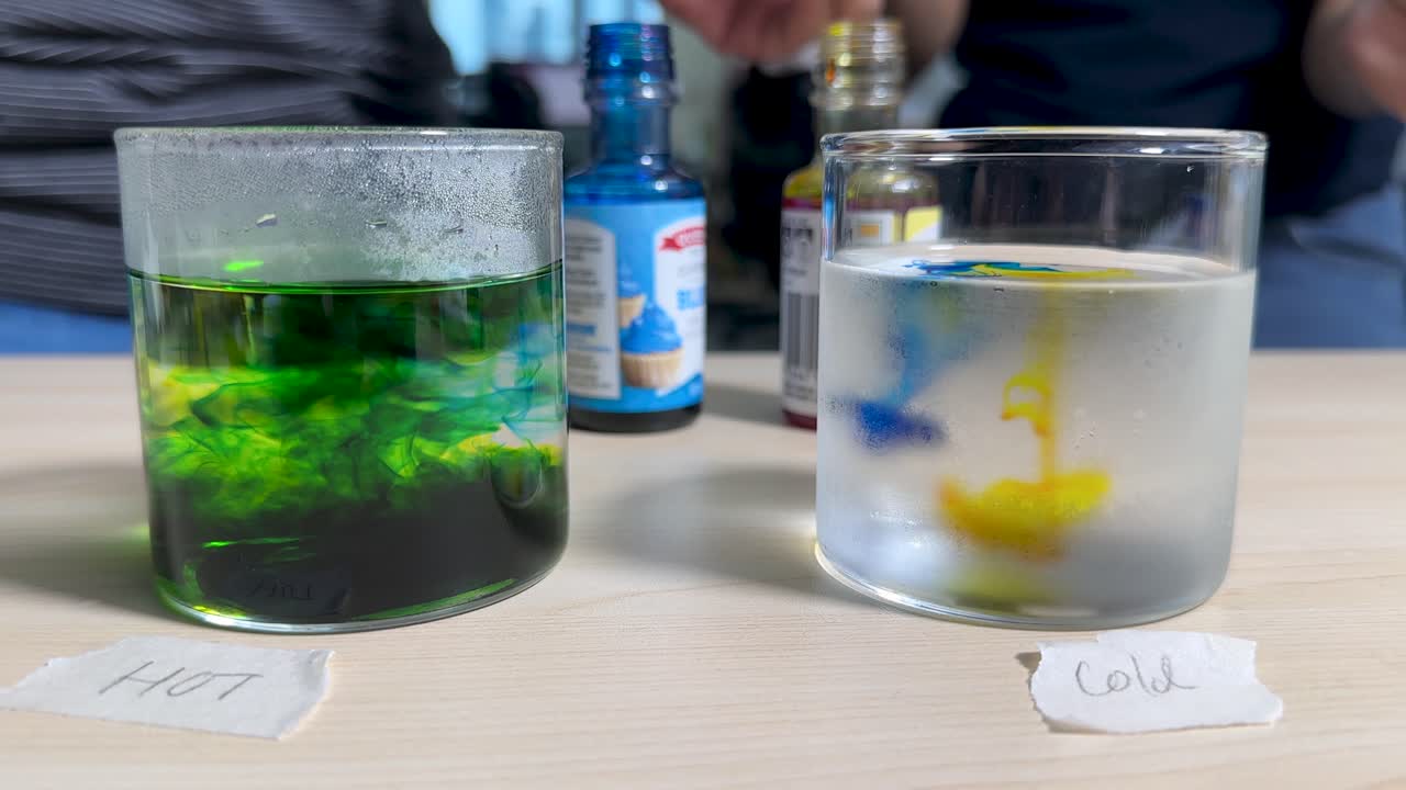 Food coloring disperses faster in hot water than cold, demonstrating temperature’s effect on diffusion