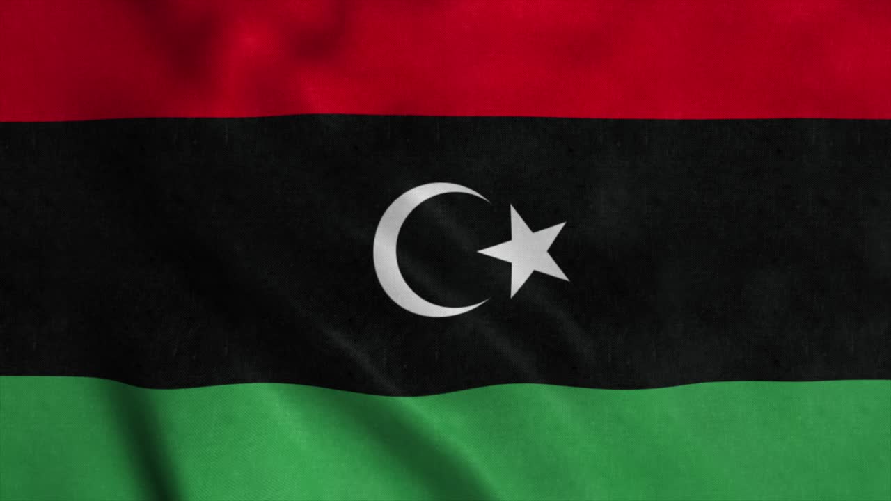 The national flag of Libya is flying in the wind. 4K
