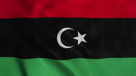 the national flag of libya is flying in the wind. 4k