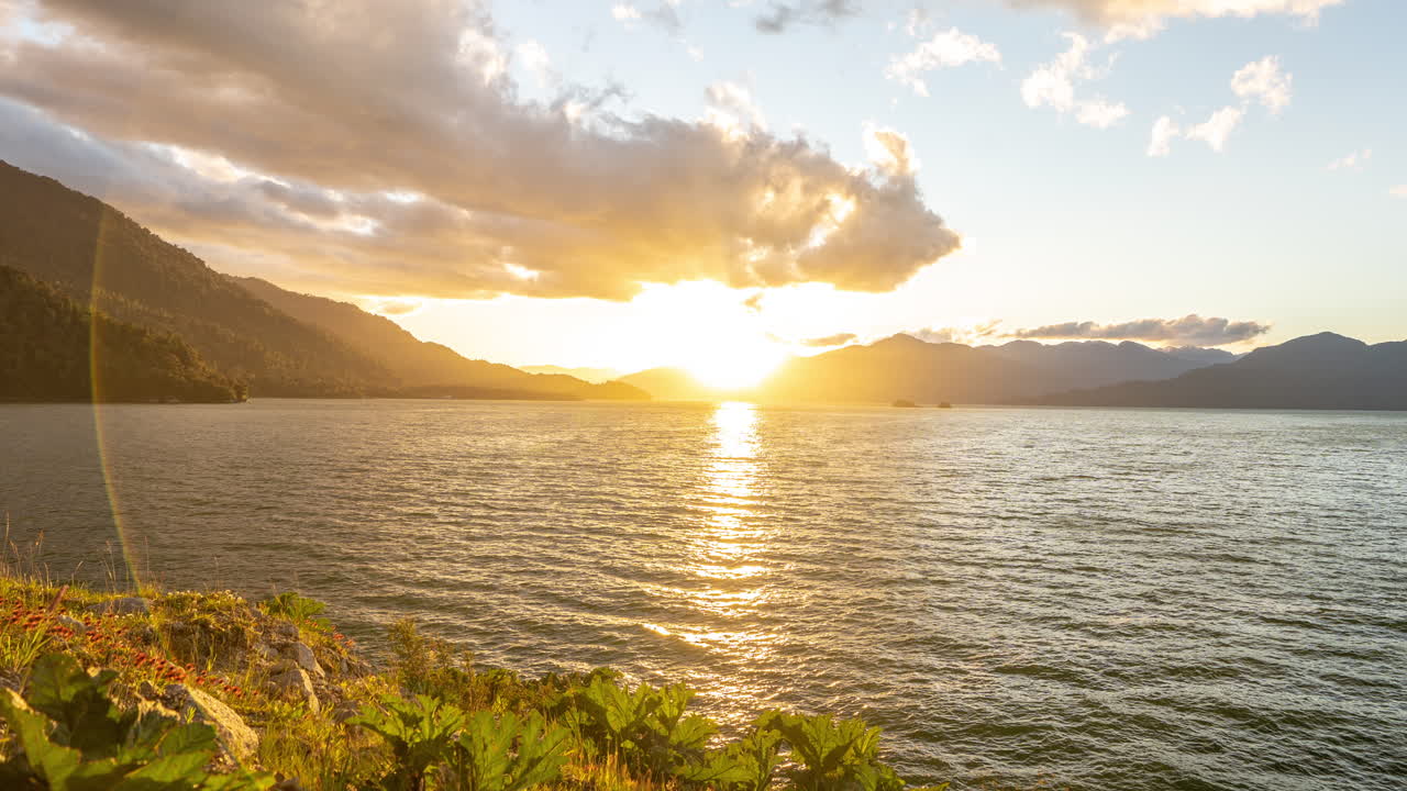 Quelat National Park, Chilean Patagonia. Sunset Hyperlapse Timelapse Above Glacial Lake and Andes in Skyline