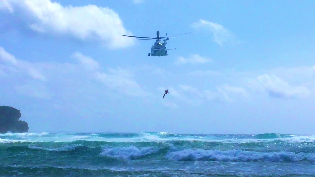 Helicopter rescue of drowning marine 2019 Okinawa Japan - Grotto