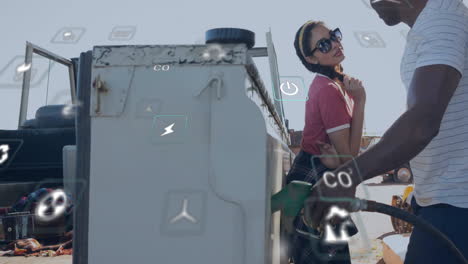 animation of eco icons and data processing over biracial man charging electric car