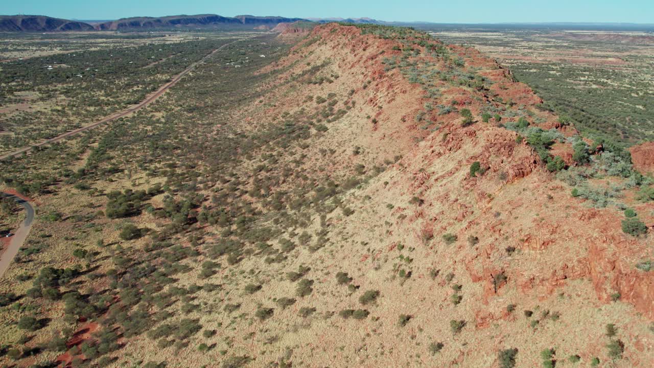 Drone footage along the MacDonnell Ranges near Roe Creek, in the Northern Territory, Australia. August 2022.
