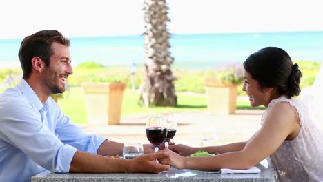happy couple having a romantic meal together