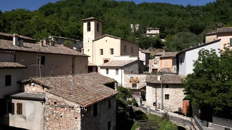 establishing shot of rasiglia, a small village located in the province of perugia