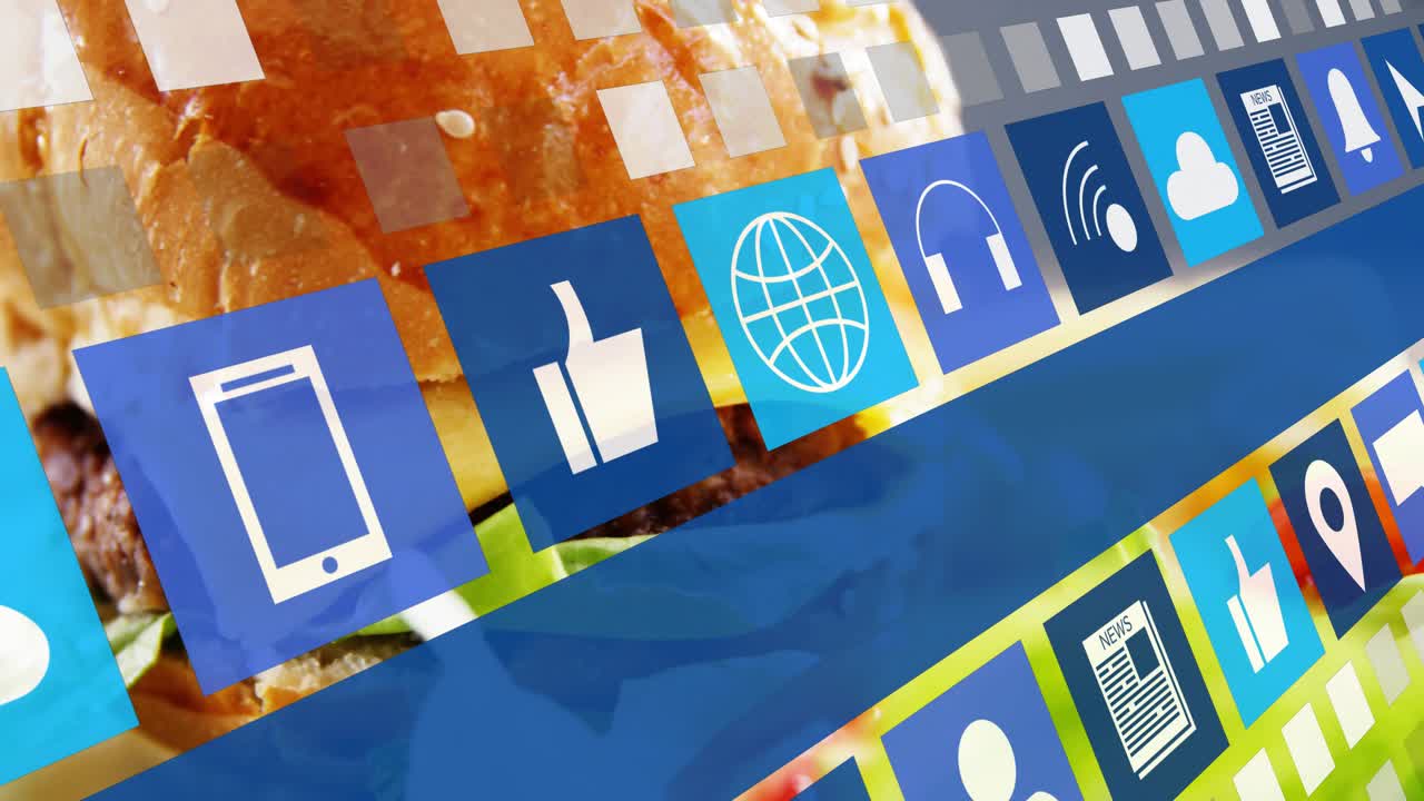 El encuadre se abre, mostrando 3 filas diagonales de iconos azules deslizándose sobre un fondo de pan de sésamo, promocionando el menú.
