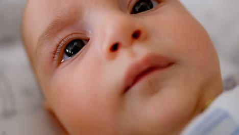 cute little baby lying in the crib 4k