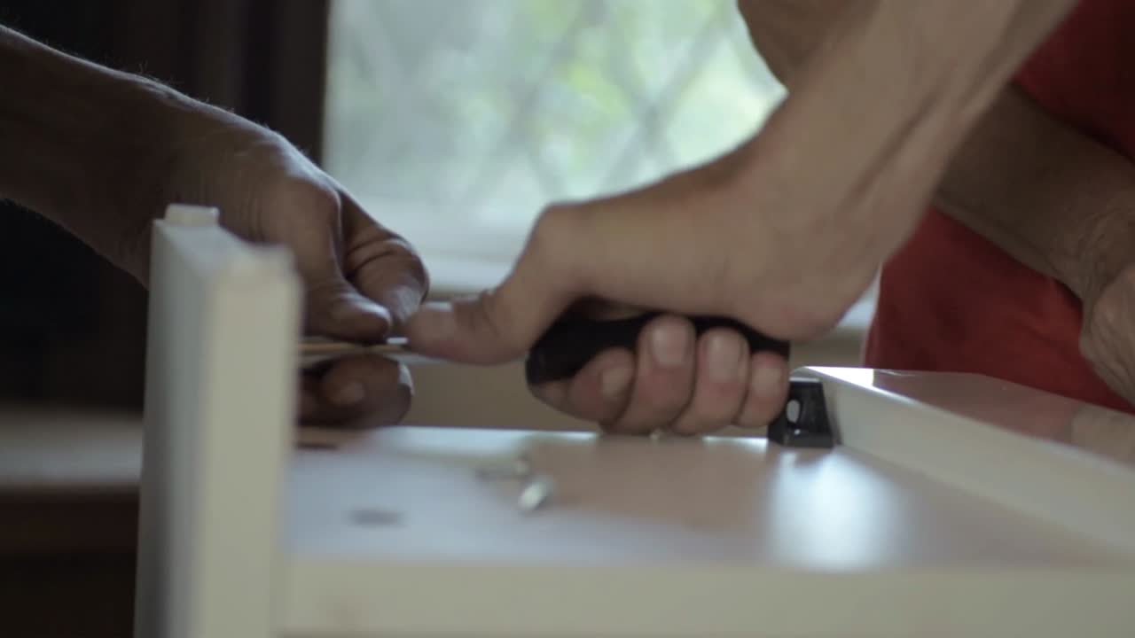 Hand using screwdriver assembling units