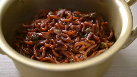 korean black spaghetti or instant noodle with roasted chajung soybean sauce - korean food style