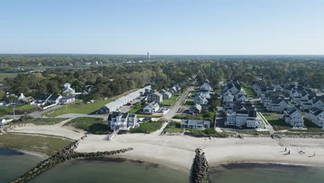 Picturesque-overview-of-residential-homes-along-scenic-coastline-of-Dennis-Port,-Cape-Cod--aerial-drone-shot